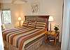 Master bedroom with king bed and private bath