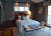 Master bedroom with queen bed, private bath and private deck on the main floor
