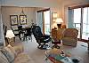 Living room and dining room with lake view