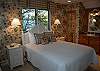 3rd bedroom with queen bed and lake view on the second floor