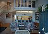 Living room and kitchen with loft above