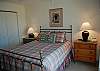 Master bedroom with private bath and lake view