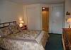 Master bedroom with queen bed and private bath on the main floor