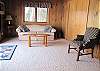 Loft area with sofa bed, lake view and deck on the second floor