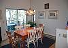 Dining room with lake view and deck