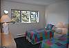 3rd bedroom with two twin beds and lake view on second floor