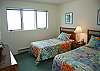 3rd bedroom with two twin beds and lake view on the second floor