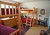 3rd bedroom with two sets of twin bunk beds on the second floor