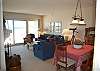 Dining room and living room with lake view