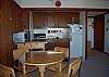 Dining table and kitchen