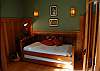 4th bedroom with twin bed with a trundle bed on the main floor