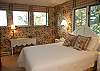 3rd bedroom with queen bed and lake view on the second floor