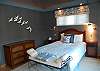 Master bedroom with queen bed, private bath and private deck on the main floor