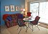 Living and dining area with lake view