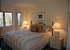 Master bedroom with king bed and private bath on main floor