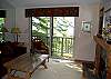 Den with fireplace, TV and lake view