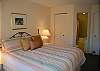 Master bedroom with king bed and private bath on main floor