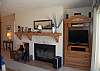 Living room fireplace and state of the art entertainment center
