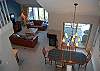 Dining room and living room with lake views
