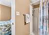 The private guest bathroom offers a standing shower, and is fully stocked with linens for your stay.