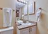Bathroom 2 offers a single vanity, and is fully stocked with linens for your stay.