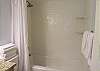 The guest bathroom features a tub/shower combo and is fully stocked with linens for your stay.