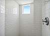 spacious and bright walk-in shower