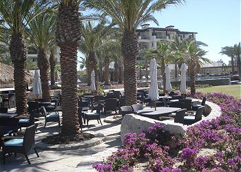 Poolside dining area in Auberge Private Residneces at Esperanza.