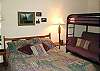 Double and a bunk bed with double on bottom and twin on top