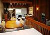 Vaulted ceilings, seating for six, bar area, open floorplan.