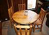 Seating for four, custom wood furnishings.