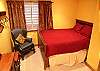 Queen bed, neutrals tones.