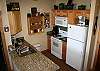 Full kitchen with all the appliances and granite counters.
