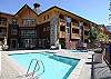 Five star amenities including fitness room, underground parking, and year-round heated swimming pool and spa.