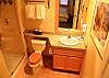 Master bath has granite counters and custom tile shower.