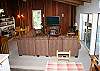 Vaulted ceilings, beautiful wood tones.