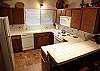 Full kitchen, dishwasher, track lighting.