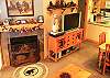 Cozy up to the custom fireplace in the Winter.