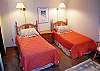 Second bedroom features two Twin beds.