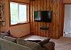 The Bed comes out of that wall where the HD television is hanging.  Very Cool.