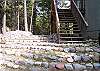 The Stairs lead up to the upper living area of the Scott Chalet.  There is a separate entrance door for the lower level apartment.  There is an internal stairway with locking doors which tie the upper levels with the ground floor appartment.