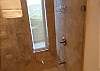 The third bathroom has a shower, toilet and a large closet.