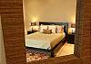 The third bedroom has a queen bed with beautiful luxury linen.