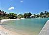 Relax on the community private beach and walk to Siesta Key village