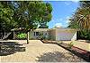 Siesta Key retreat with heated pool, close to village and beaches.