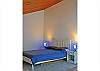 2nd bedroom / loft. Has 1 queen-size bed and 2 twin-size beds