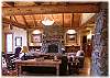 Beautiful rock fireplace in the upstairs living room (there is a TV hidden behind the photo to the left of the fireplace)