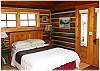 Master bedroom with a queen size bed