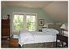 Upper loft bedroom with a Queen size bed