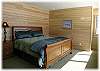 King size bed with luxury linens and attached private bath
